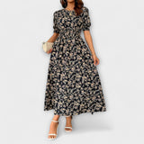 Amelia – Vestido com Decote Redondo e Padrão Floral