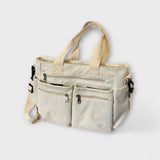 Maria. - Mala com vários bolsos